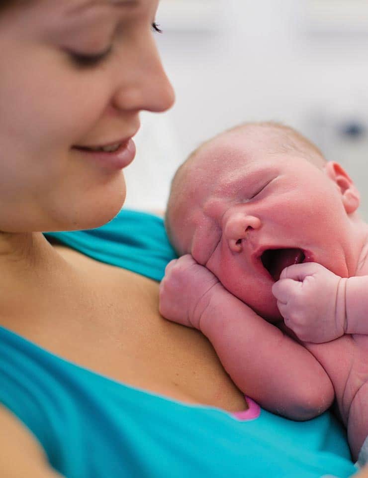 Mother Holding Her Baby 1