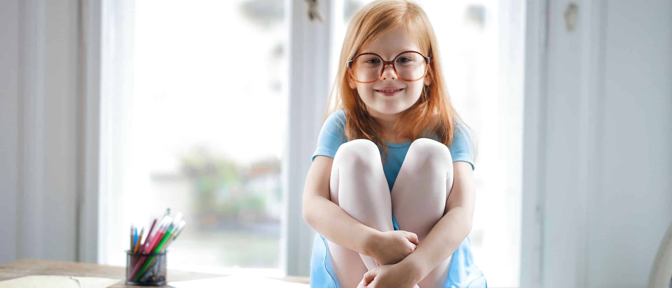 Girl with Glasses Sitting Girl with Glasses Sitting
